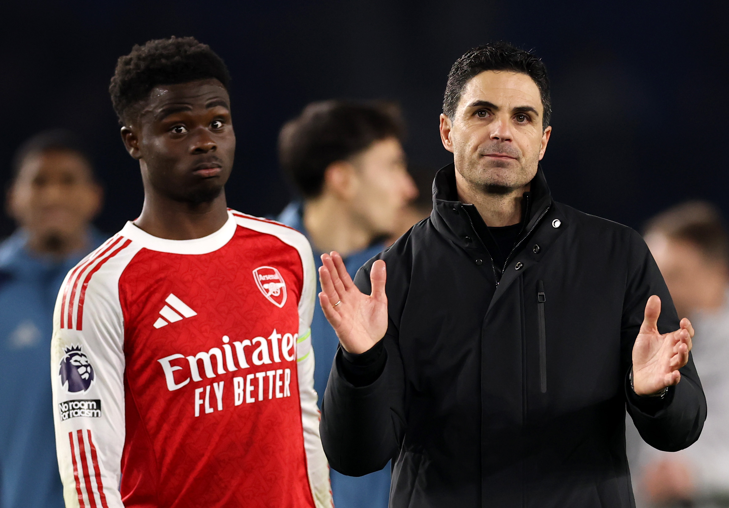 Bukayo Saka and Mikel Arteta
