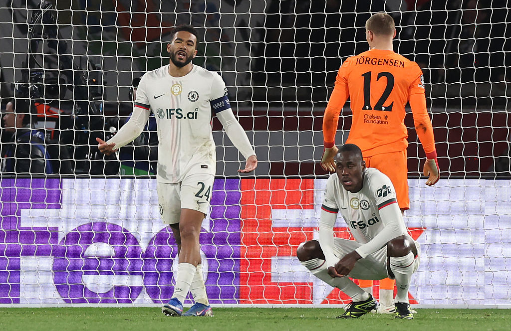 Chelsea players react after conceding to PSG
