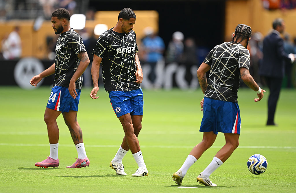 Levi Colwill warming up with his Chelsea team-mates