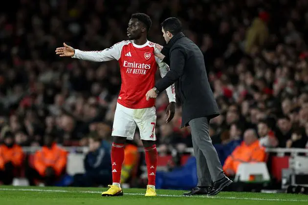 Bukayo Saka and Mikel Arteta