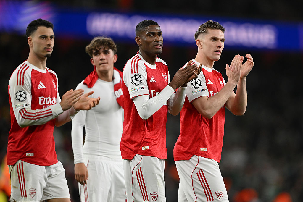 Arsenal celebrate after beating Sporting