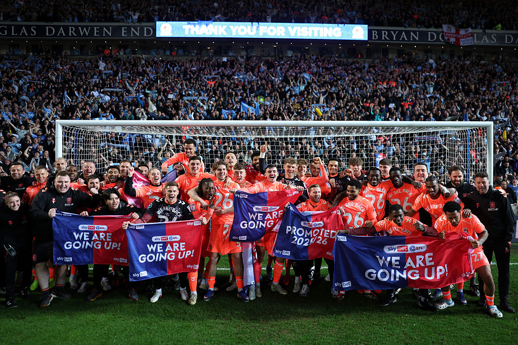 Coventry's players celebrate winning promotion