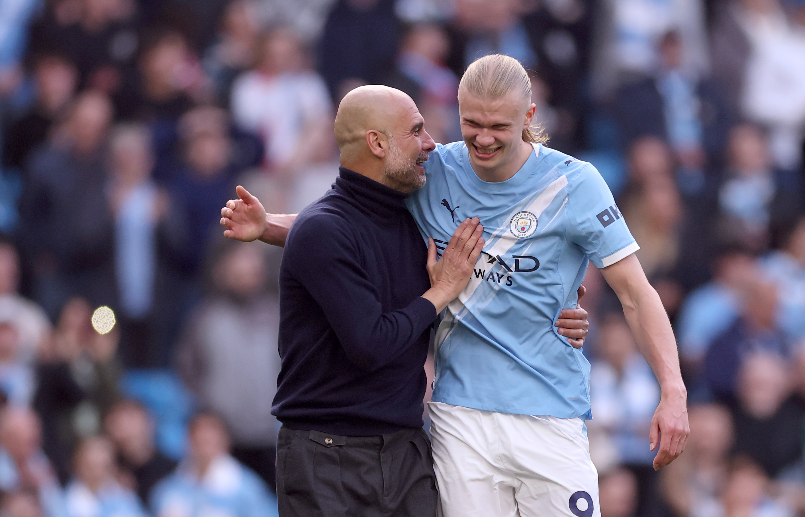 Pep Guardiola and Erling Haaland