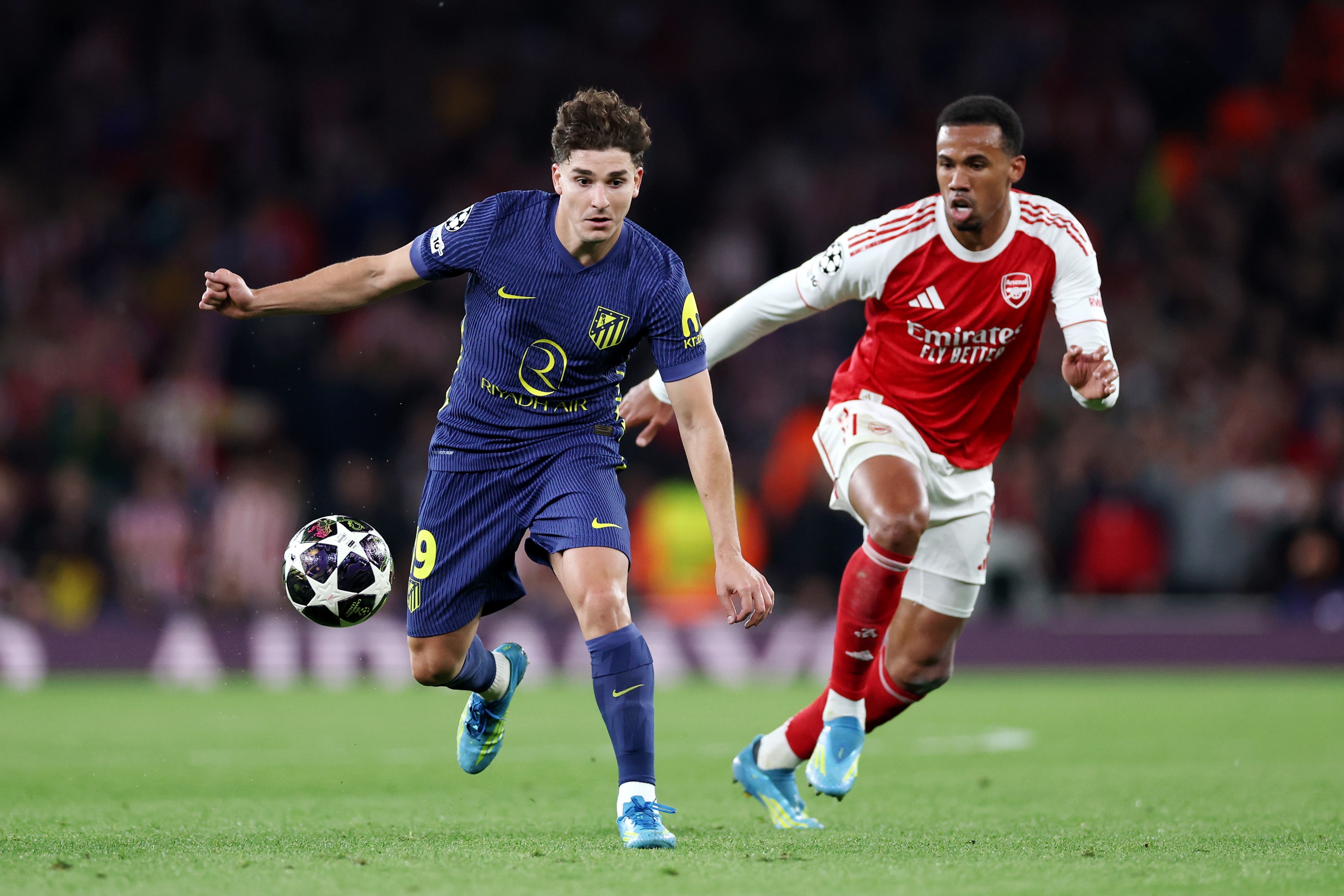 Atletico Madrid's Julian Alvarez and Arsenal's Gabriel Magalhaes