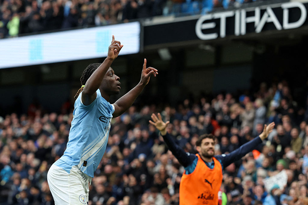Jeremy Doku celebrates his goal