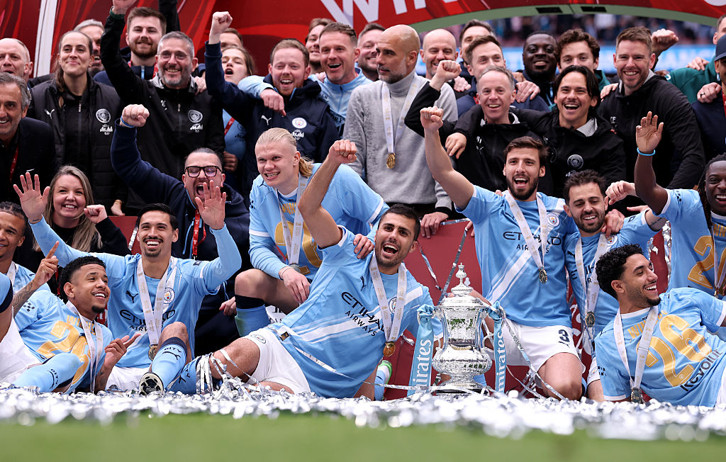 Man City celebrate winning the FA Cup