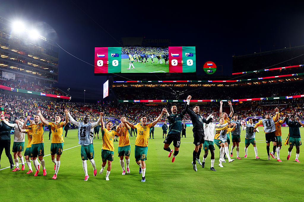 Australia celebrate going through to the knockouts