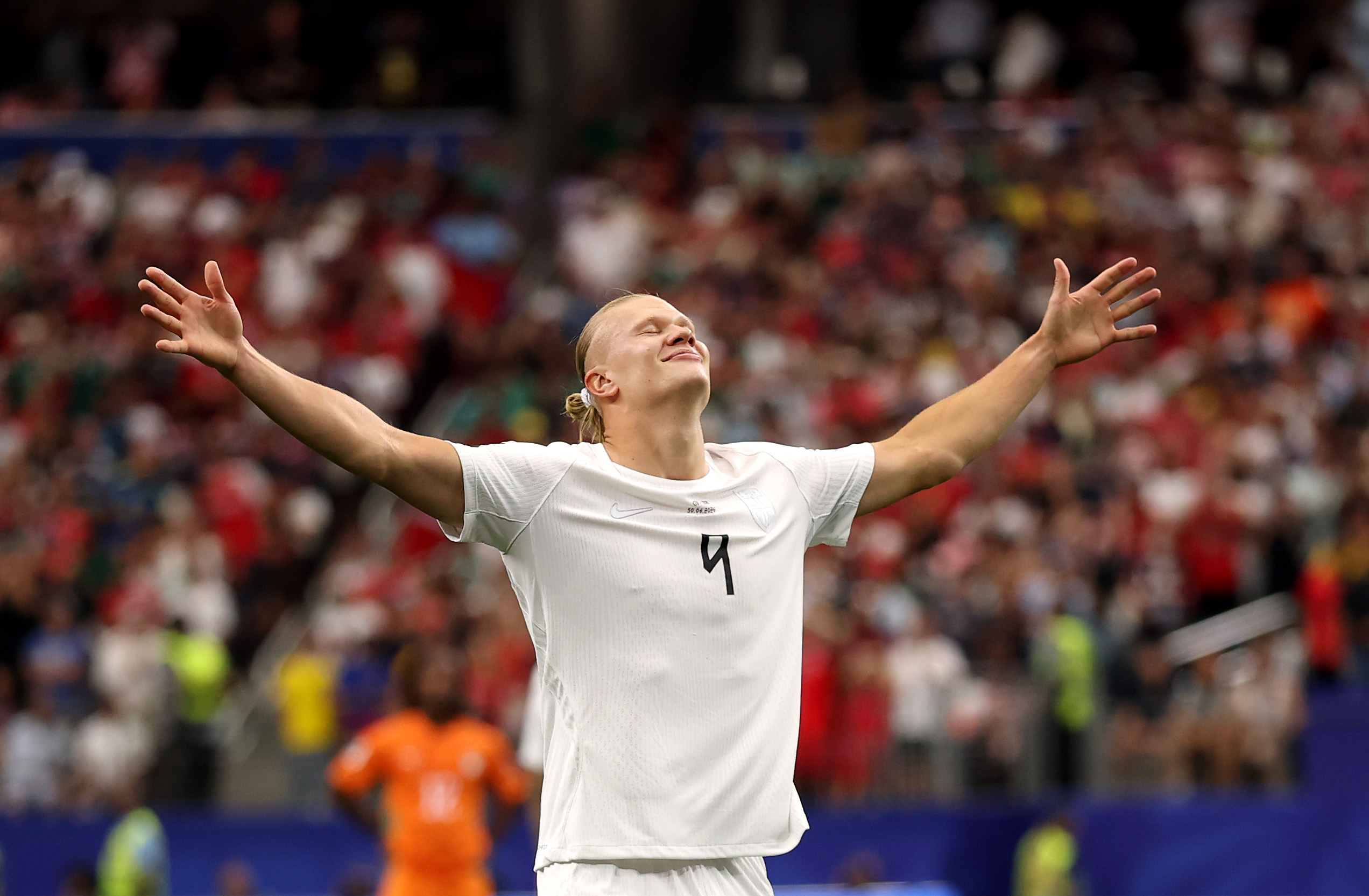 Erling Haaland celebrates after his late winner