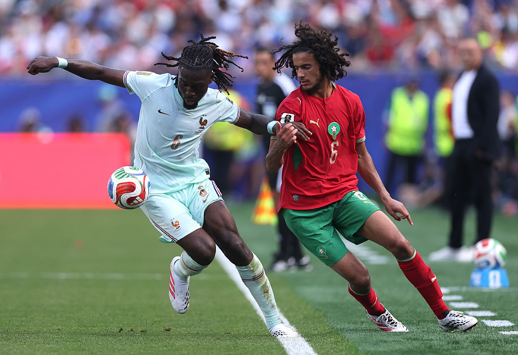 Manu Kone (left) in action for France