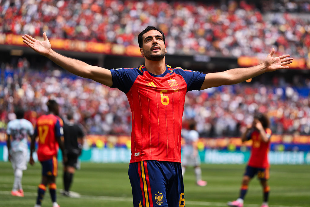 Mikel Merino celebrates his winner against Belgium