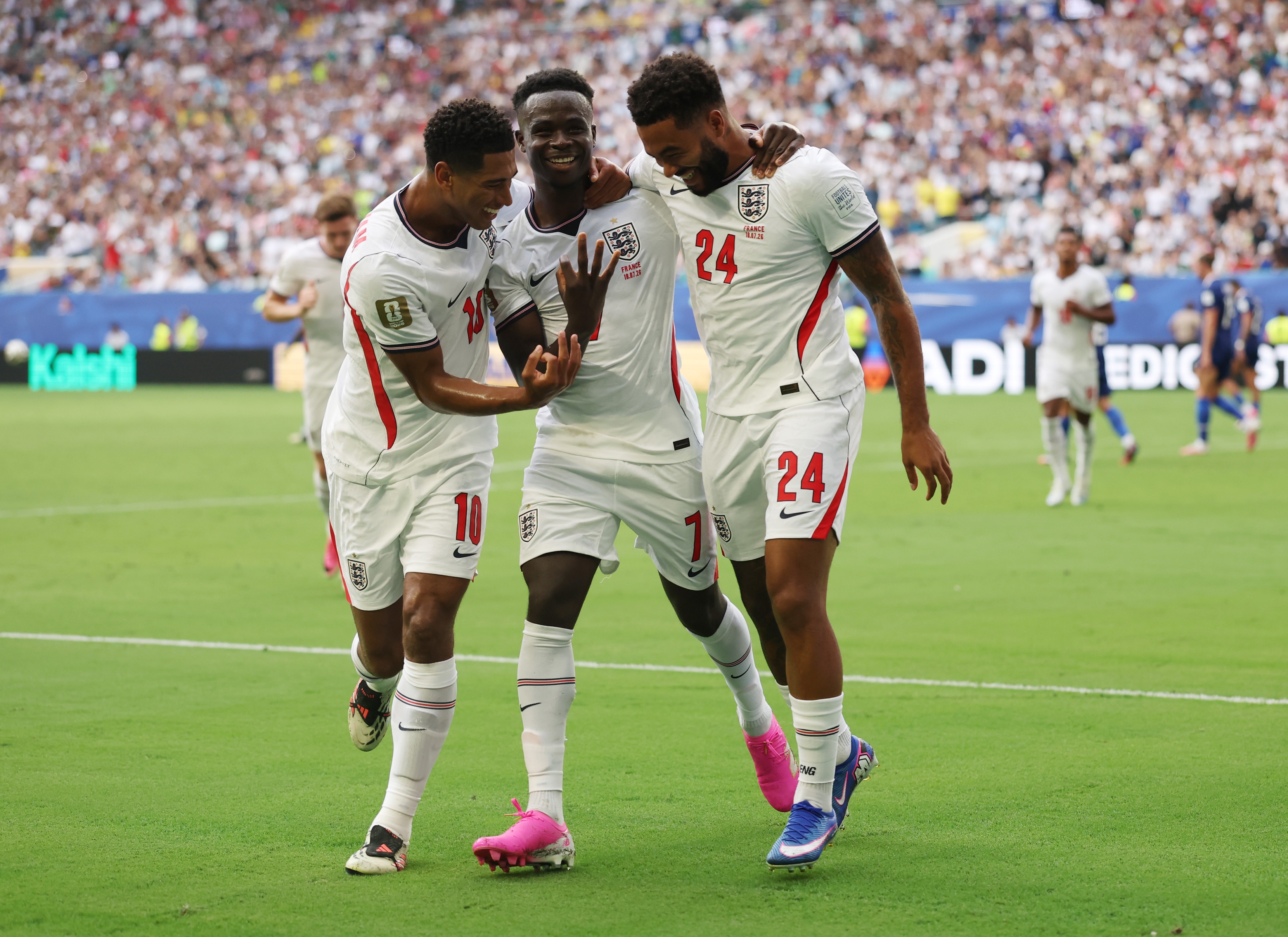 Bukayo Saka celebrates his hat trick for England against France