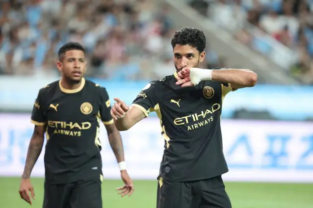 Omar Marmoush celebrates