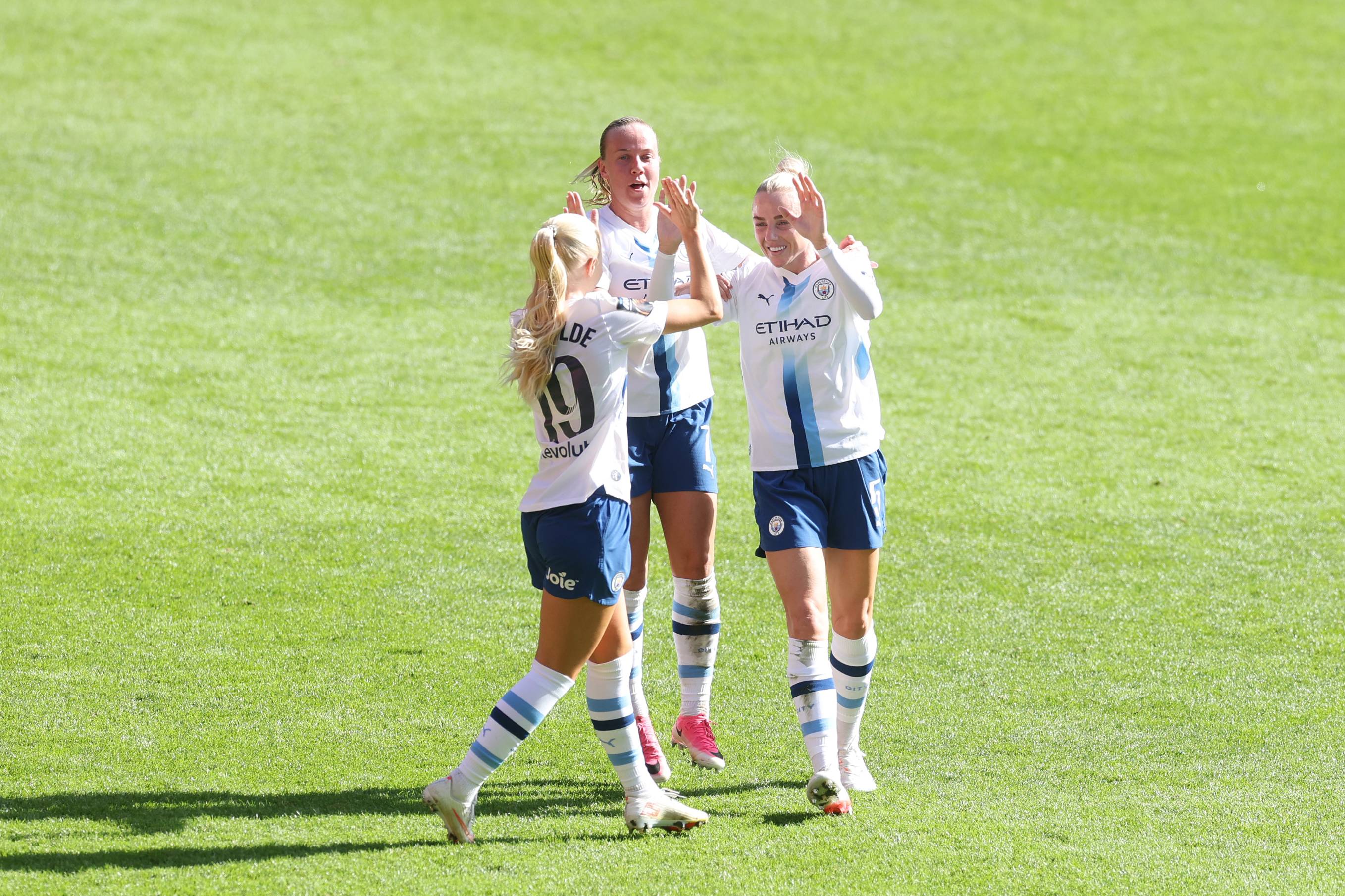 Alex Greenwood celebrates