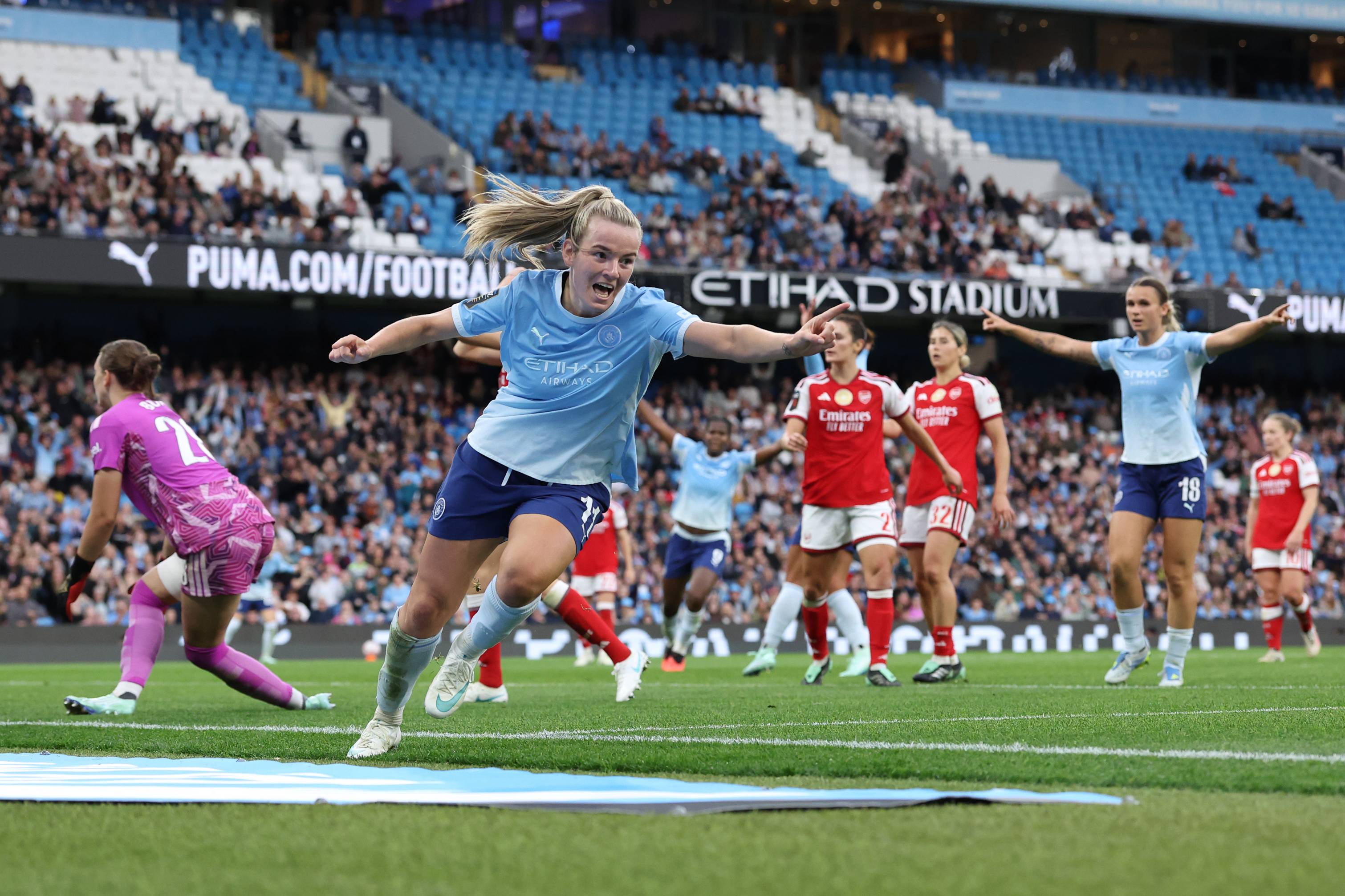 Lauren Hemp celebrates